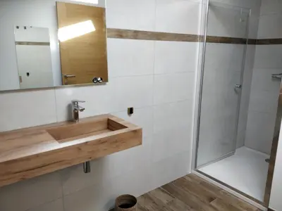 a bathroom with a sink and a shower at Casa voscia in Casalabriva