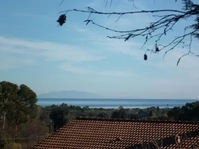 a view of the ocean from the roof of a house at bas de villa de 90m² entre mer (2km) et montagne in Talasani