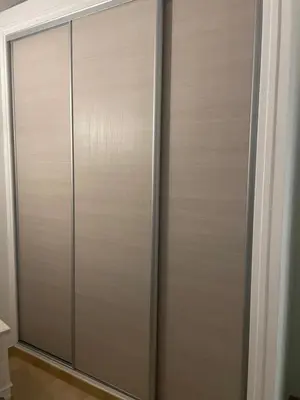 a closet with a metal door in a room at VILLA tous conforts avec Piscine privée et accès Plage in Cervione
