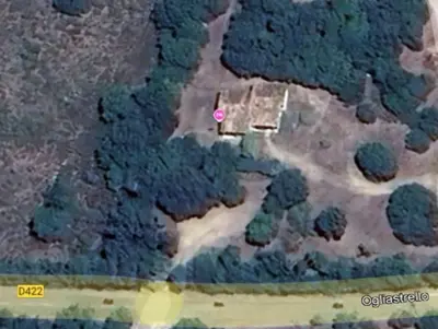 an aerial view of a house in a forest at Les bergeries d'Ogliastrello in Figari