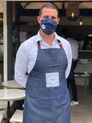 a man with a mask on his face at Maison de village en granite in Porto-Vecchio