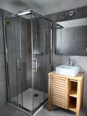 a bathroom with a shower and a sink at SANTA-LUCIA in Santa-Lucia-di-Moriani