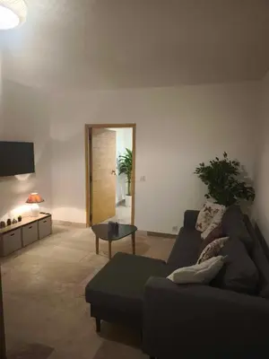 a living room with a couch and a table at Casa di Mela in Mela