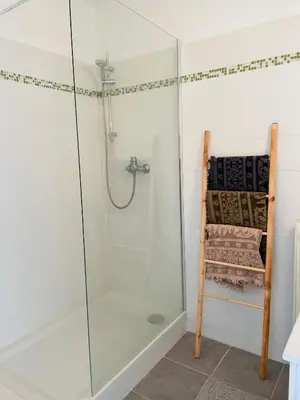a shower with a glass enclosure in a bathroom at Spacieux 2 pièces Centre Historique Ajaccio in Ajaccio