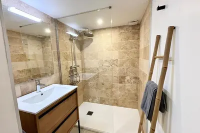 a bathroom with a sink and a shower at Casamea - Vue Mer, Centre Ajaccio, Clim & WiFi in Ajaccio