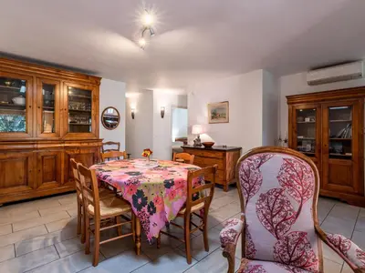 a dining room with a table and chairs at Holiday Home Casa Brigitte by Interhome in Sainte-Lucie de Porto-Vecchio
