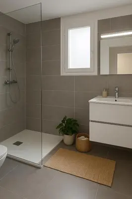 a bathroom with a shower and a toilet and a sink at Résidence Arborea C4 corte in Corte