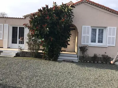 a house with a large bush in front of it at villa gambotti in Morta