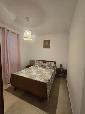 a bathroom with a sink and a shower with a mirror at villa gambotti in Morta