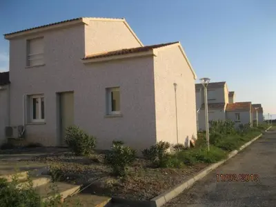 a small house on the side of a street at VILLA T3 bord de mer - vue mer à 500 m de la plage- piscine chauffée A CASETTA DI A SPIAGGIA in Cervione
