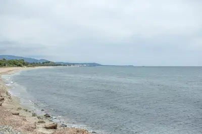 a view of the beach from the shore at VILLA T3 bord de mer - vue mer à 500 m de la plage- piscine chauffée A CASETTA DI A SPIAGGIA in Cervione
