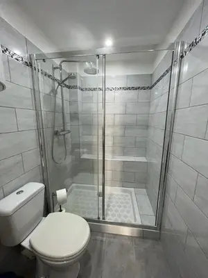 a bathroom with a toilet and a shower at A COLETTA in Piana