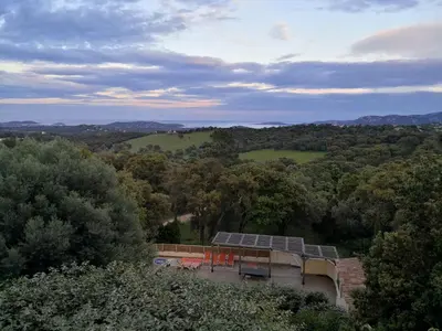 an aerial view of a house in the middle of a forest at Villa Maremuntagna Porto Vecchio in Porto-Vecchio
