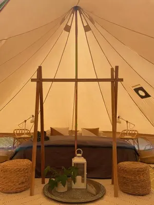 a white tent sitting on top of a wooden deck at CORSICA NATURA #1 in Coti-Chiavari