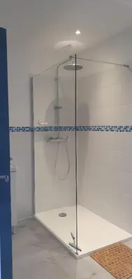 a glass shower stall in a bathroom at Vue de rêve in Calcatoggio